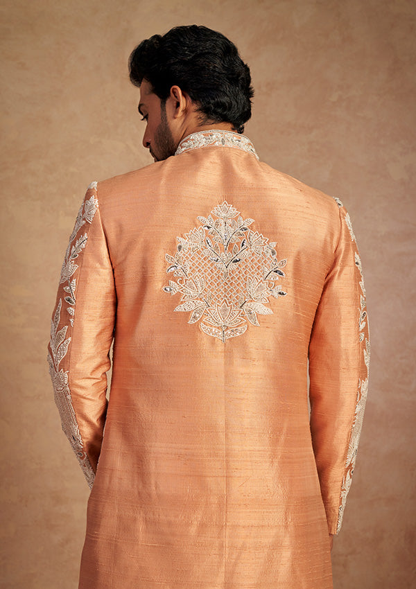 Bunt orange raw silk sherwani with zardozi salli pearl work
